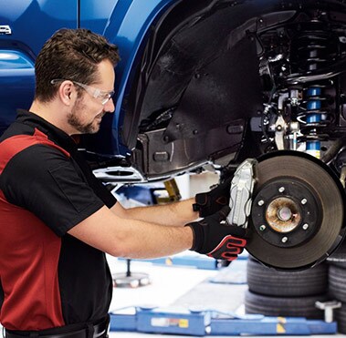 Toyota Technician working on car brakes in Ramsey, NJ